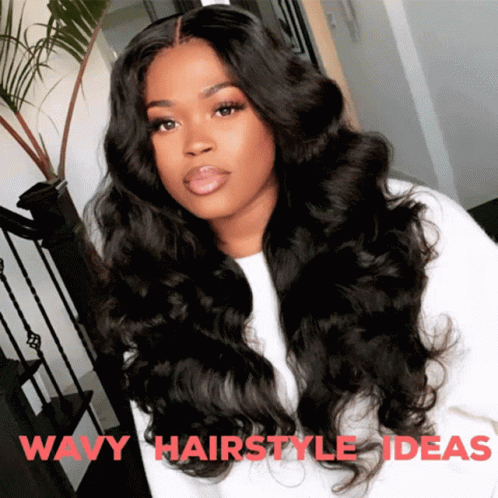 A Woman With Long Wavy Hair Is Wearing A White Shirt With The Words Wavy Hairstyle Ideas Above Her GIF