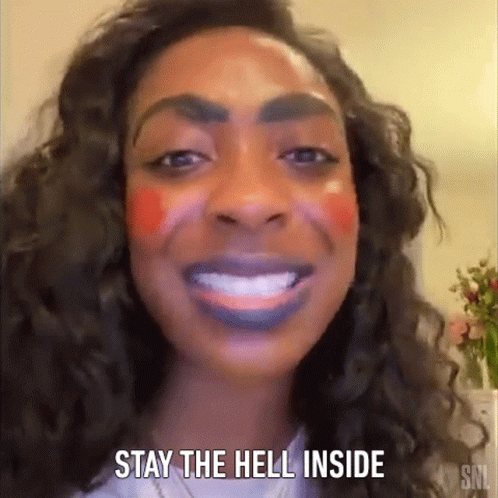 A Woman With Makeup On Her Face And The Words `` Stay The Hell Inside '' Written On Her Face . GIF