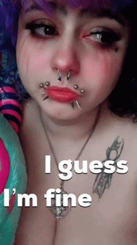 A Woman With Piercings On Her Face And The Words I Guess I 'M Fine Below Her GIF