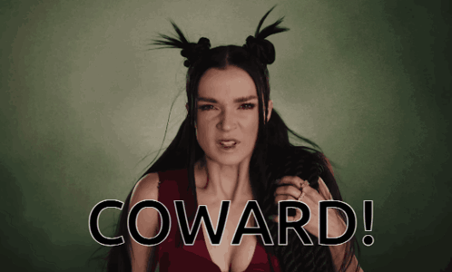A Woman With Pigtails And The Word Coward On The Bottom Right GIF