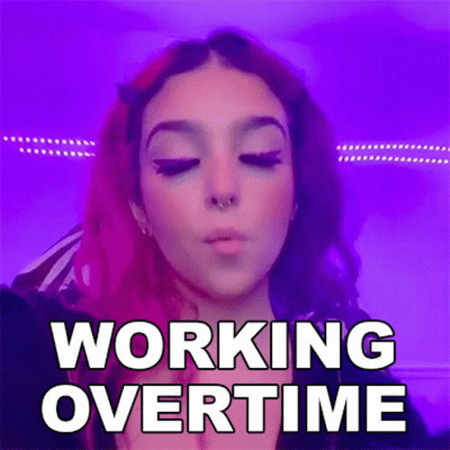 A Woman With Pink Hair Is Blowing A Kiss In Front Of A Purple Background With The Words `` Working Overtime '' . GIF