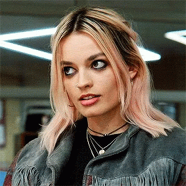 Woman With Pink Hair Wearing Fringed Jacket GIF