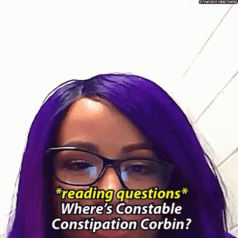 A Woman With Purple Hair And Glasses Is Asking Where 'S Constable Constipation Corbin . GIF