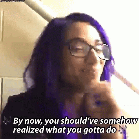 a woman with purple hair and glasses says `` by now , you should ve somehow realized what you gotta do '' .