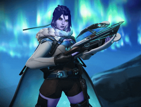 A Woman With Purple Hair Holding A Crossbow In Front Of The Aurora Borealis GIF