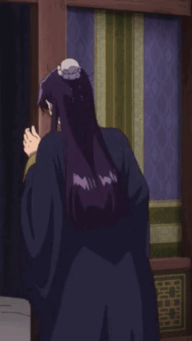 Woman With Purple Hair Standing By Window GIF