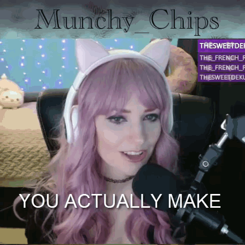 A Woman With Purple Hair Is Wearing Headphones And A Cat Ear Headband And Says " You Actually Make " GIF