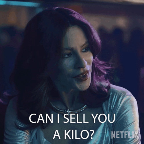 A Woman With Purple Hair Says " Can I Sell You A Kilo " In A Netflix Ad GIF