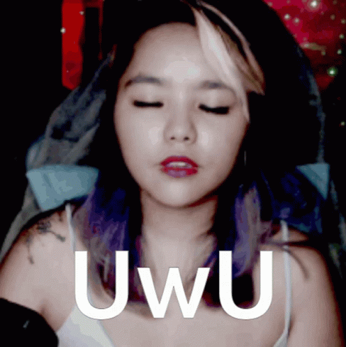 A Woman With Purple Hair Says Uwu In Front Of Her GIF