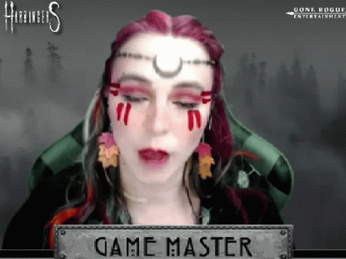 A Woman With Red Hair And A Crescent Moon On Her Forehead Is A Game Master GIF