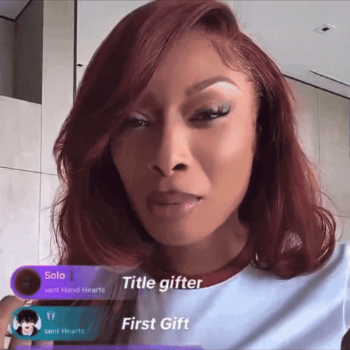 a woman with red hair and a purple banner that says title gifter
