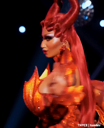 a woman with red hair and horns is wearing a costume that says t4yce tumblr