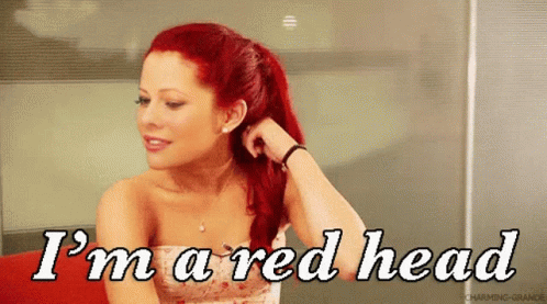 A Woman With Red Hair Has The Words I 'M A Red Head Above Her GIF