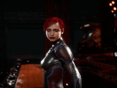 A Woman With Red Hair Is Holding A Red Stick In Her Hand GIF
