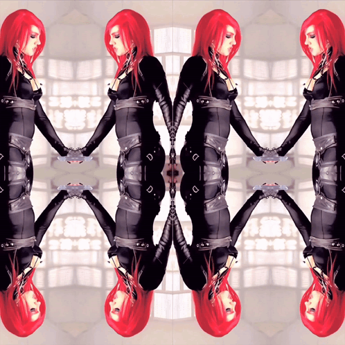 a woman with red hair is holding hands with her reflection in a mirror