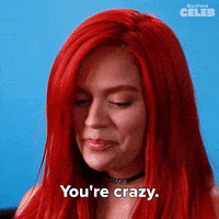 A Woman With Red Hair Is Saying You 'Re Crazy . GIF