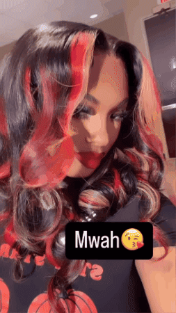 A Woman With Red Hair Is Wearing A Black Shirt With A Basketball On It GIF