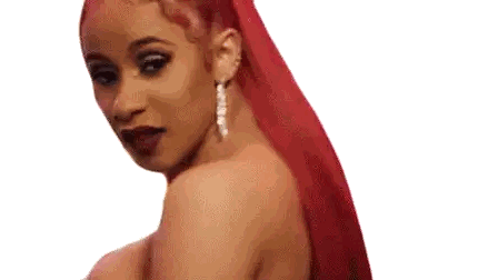 a woman with red hair is wearing earrings and a ponytail .