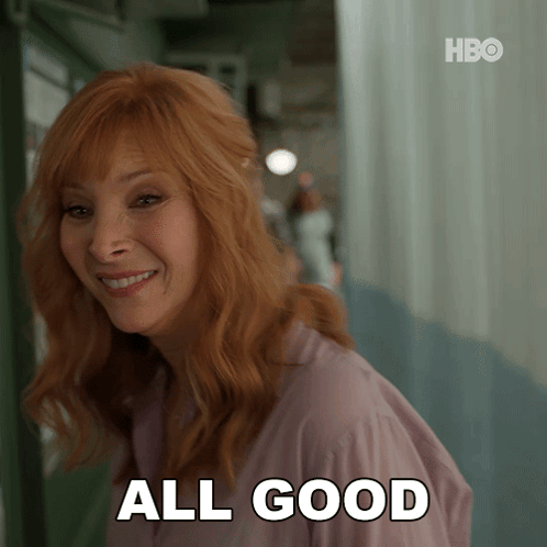 A Woman With Red Hair Says All Good GIF