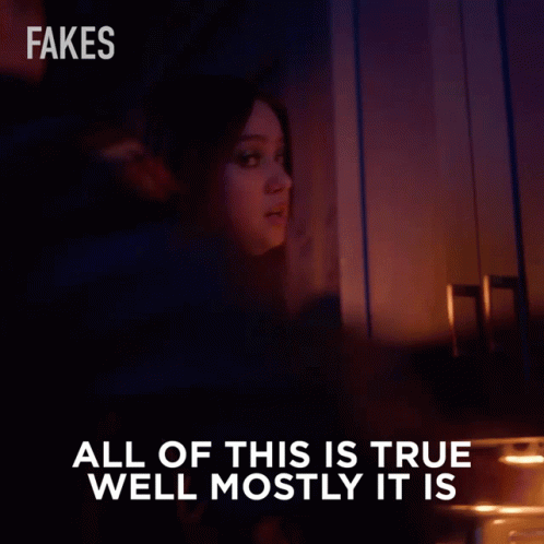 A Woman With Red Hair Says All Of This Is True Well Mostly It Is In A Dark Room GIF