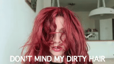 A Woman With Red Hair Says Do N't Mind My Dirty Hair . GIF