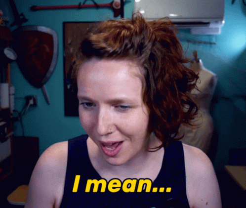 A Woman With Red Hair Says I Mean GIF