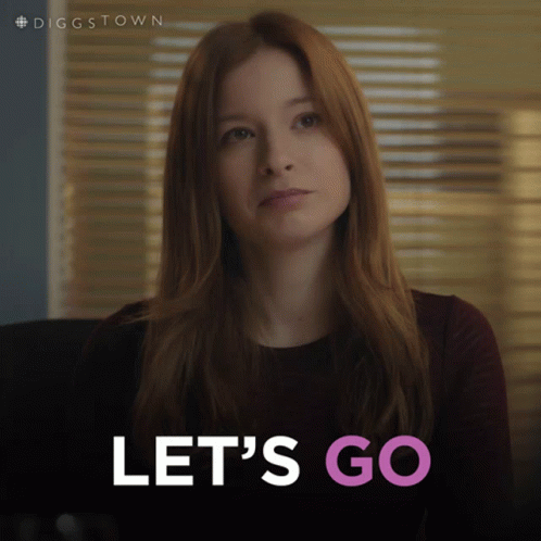 Woman With Red Hair Says Lets Go GIF