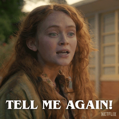 a woman with red hair says tell me again on a netflix advertisement