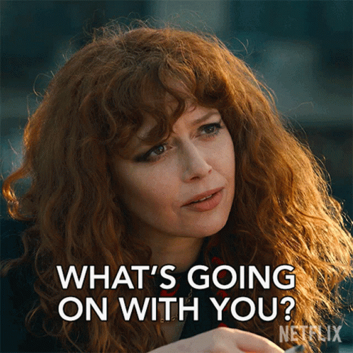 A Woman With Red Hair Says " What 'S Going On With You ? " GIF