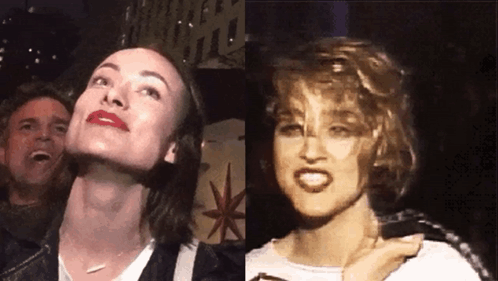 A Woman With Red Lipstick And A Man Laughing In The Background GIF