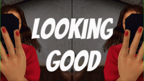 A Woman With Red Nail Polish Is Holding A Black Box And The Words Looking Good Are Behind Her GIF