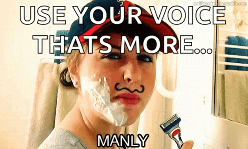 A Woman With Shaving Cream On Her Face Is Holding A Razor And Says Use Your Voice That 'S More Manly GIF