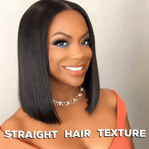 A Woman With Straight Hair Texture Is Smiling And Wearing An Orange Top GIF