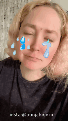 A Woman With Tears On Her Face And The Words Insta @Punjabigorii On The Bottom GIF