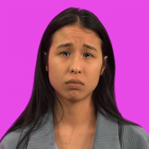 A Woman With Tears Running Down Her Face GIF