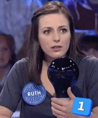 A Woman With The Name Ruth On Her Shirt GIF