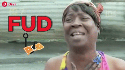 A Woman With The Word Fud On Her Face GIF