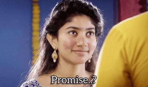 A Woman With The Word Promise Written On It GIF