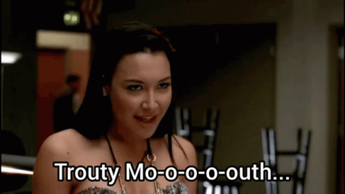 A Woman With The Words Trouty Mo-O-O-O-Outh Written On Her Face GIF