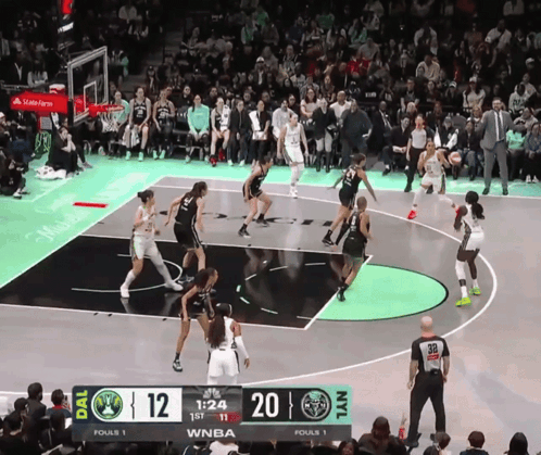 A Women 'S Basketball Game Is Being Played And The Score Is 12 To 20 GIF