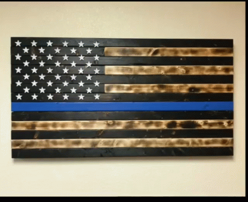 A Wooden American Flag With A Blue Stripe GIF