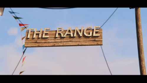 A Wooden Sign That Says The Range Hangs From A Pole GIF