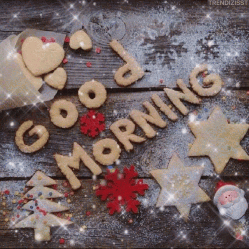 A Wooden Table Topped With Christmas Cookies And The Words Good Morning GIF