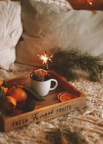 a wooden tray with fresh finest fruits on it