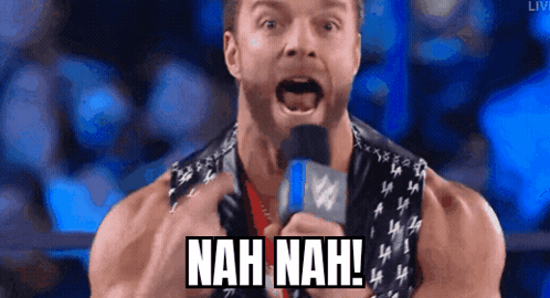 A Wrestler Is Holding A Microphone And Saying " Nah Nah " GIF