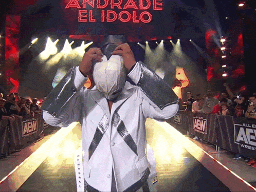 A Wrestler Named Andrade El Idolo Walks Down The Aisle GIF