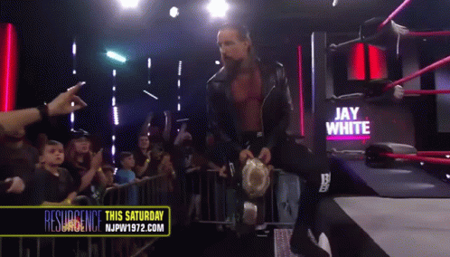a wrestler named jay white is walking out of a ring