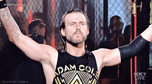 Wrestler Wearing Black Tank Top Saying Adam Cole GIF