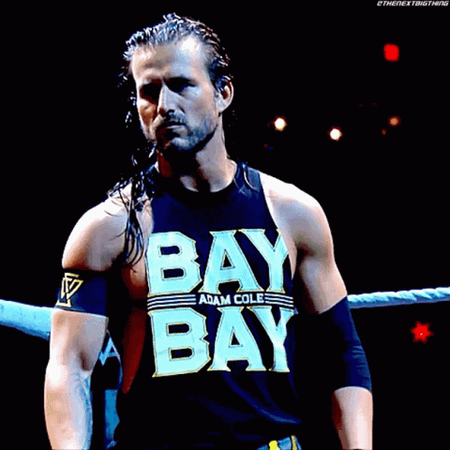 A Wrestler Wearing A Black Tank Top With The Word Bay On It GIF