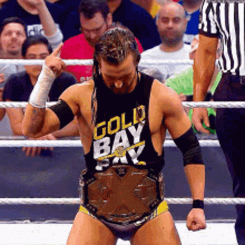 Wrestler In Gold Bay Bay Shirt In Ring GIF